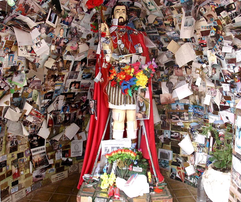 His statue at the Bermejo sanctuary, San Juan, Argentina, papered in thanks